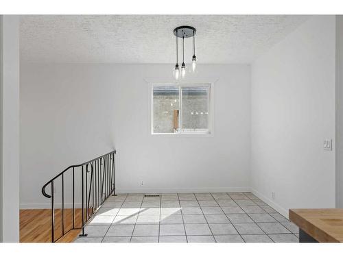 343 Pinetree Road Ne, Calgary, AB - Indoor Photo Showing Other Room