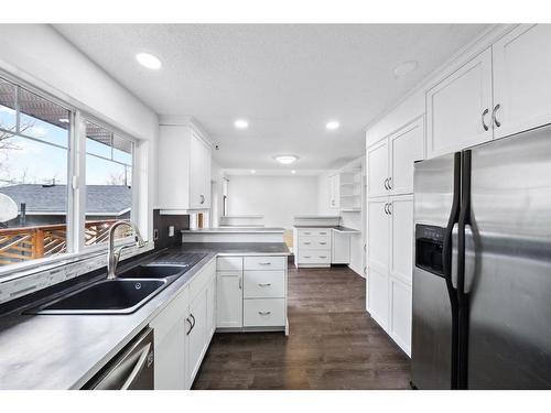 12152 Canfield Road Sw, Calgary, AB - Indoor Photo Showing Kitchen With Double Sink