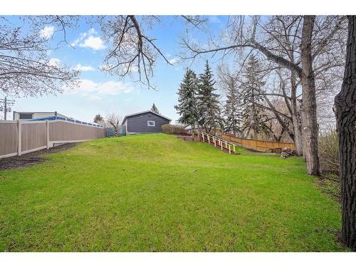 12152 Canfield Road Sw, Calgary, AB - Outdoor With Backyard