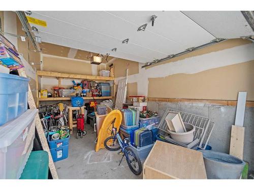 1-7 Westland Road, Okotoks, AB - Indoor Photo Showing Garage