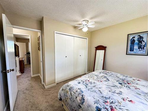5102 57 Avenue, Olds, AB - Indoor Photo Showing Bedroom