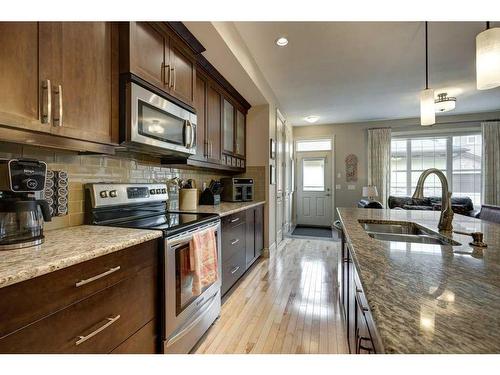 222 Quarry Park Boulevard Se, Calgary, AB - Indoor Photo Showing Kitchen With Double Sink With Upgraded Kitchen
