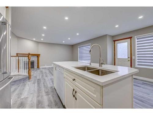 12530 Douglas Woods Road Se, Calgary, AB - Indoor Photo Showing Kitchen With Double Sink