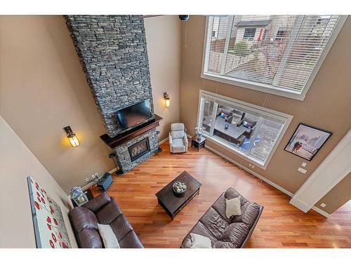 163 Panatella View Nw, Calgary, AB - Indoor With Fireplace
