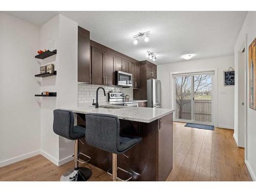 1304-2400 Ravenswood View Se, Airdrie, AB - Indoor Photo Showing Kitchen With Upgraded Kitchen