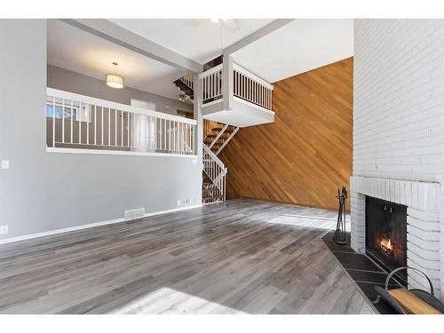 6-10401 19 Street Sw, Calgary, AB - Indoor With Fireplace
