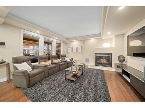 7 Auburn Sound Cove Se, Calgary, AB - Indoor Photo Showing Living Room With Fireplace