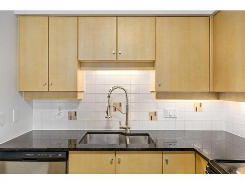 404-650 10 Street Sw, Calgary, AB - Indoor Photo Showing Kitchen With Double Sink