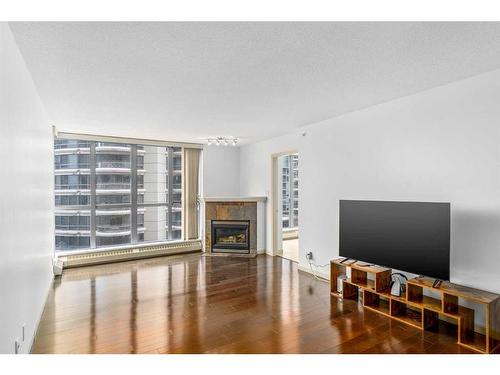 404-650 10 Street Sw, Calgary, AB - Indoor With Fireplace