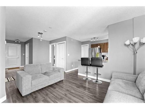701-10 Kincora Glen Park Nw, Calgary, AB - Indoor Photo Showing Living Room