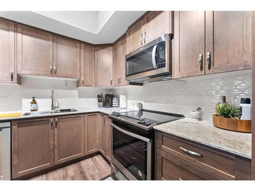 2115-3727 Sage Hill Drive Nw, Calgary, AB - Indoor Photo Showing Kitchen