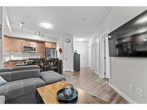 2115-3727 Sage Hill Drive Nw, Calgary, AB - Indoor Photo Showing Living Room