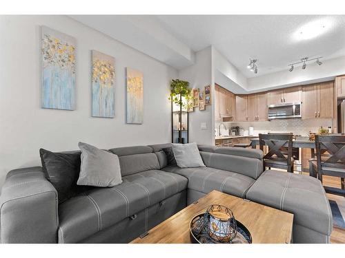 2115-3727 Sage Hill Drive Nw, Calgary, AB - Indoor Photo Showing Living Room