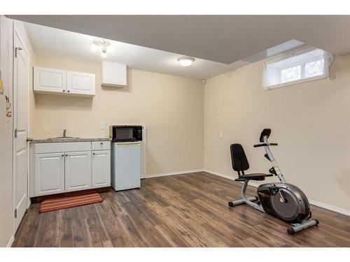 54 Arbour Crest Circle Nw, Calgary, AB - Indoor Photo Showing Gym Room