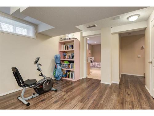 54 Arbour Crest Circle Nw, Calgary, AB - Indoor Photo Showing Gym Room