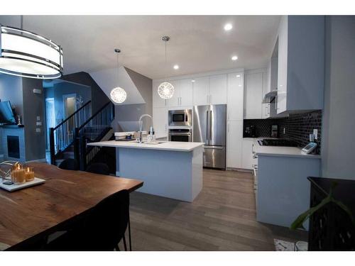 2-138 22 Avenue Ne, Calgary, AB - Indoor Photo Showing Kitchen With Upgraded Kitchen