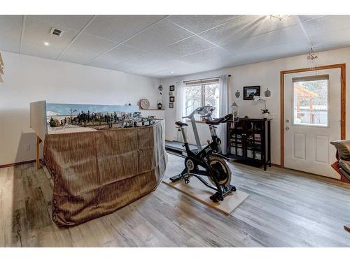 110 Arbour Summit Close Nw, Calgary, AB - Indoor Photo Showing Gym Room