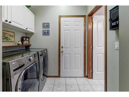 110 Arbour Summit Close Nw, Calgary, AB - Indoor Photo Showing Laundry Room