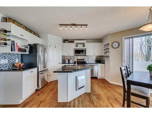 26 Hidden Ridge Close Nw, Calgary, AB - Indoor Photo Showing Kitchen With Stainless Steel Kitchen With Upgraded Kitchen