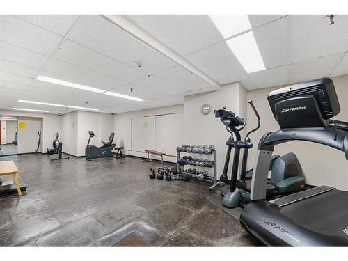 704-1011 12 Avenue Sw, Calgary, AB - Indoor Photo Showing Gym Room