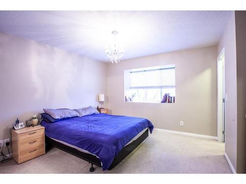 1604-703 Luxstone Square Sw, Airdrie, AB - Indoor Photo Showing Bedroom