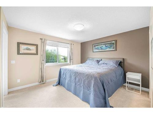 112 Ridge View Close, Cochrane, AB - Indoor Photo Showing Bedroom