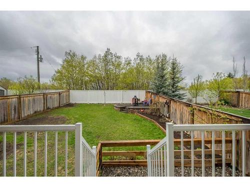 112 Ridge View Close, Cochrane, AB - Outdoor With Backyard