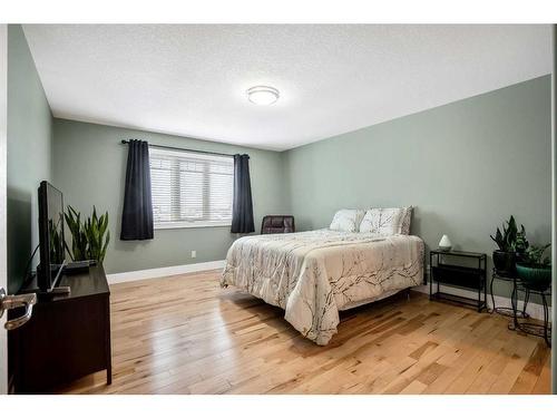 134 Montenaro Crescent, Rural Rocky View County, AB - Indoor Photo Showing Bedroom