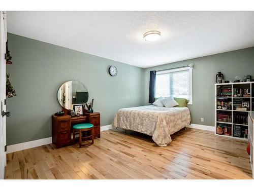 134 Montenaro Crescent, Rural Rocky View County, AB - Indoor Photo Showing Bedroom