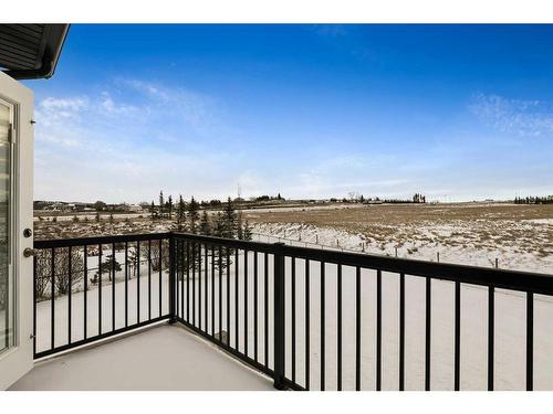 134 Montenaro Crescent, Rural Rocky View County, AB - Outdoor With Balcony