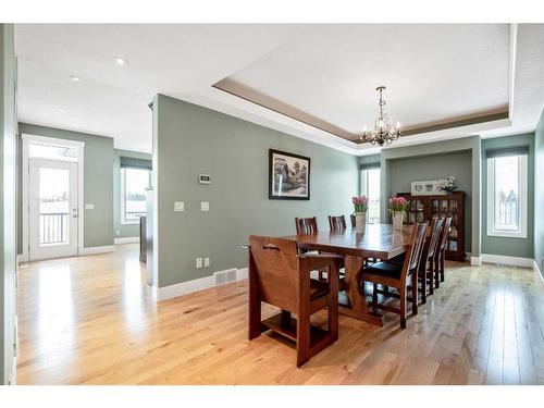 134 Montenaro Crescent, Rural Rocky View County, AB - Indoor Photo Showing Dining Room