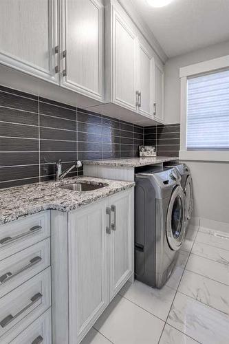 168 Kinniburgh Loop, Chestermere, AB - Indoor Photo Showing Laundry Room
