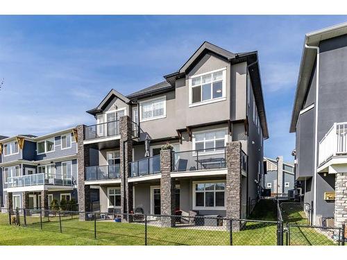 168 Kinniburgh Loop, Chestermere, AB - Outdoor With Balcony With Facade