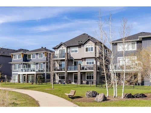 168 Kinniburgh Loop, Chestermere, AB - Outdoor With Balcony With Facade
