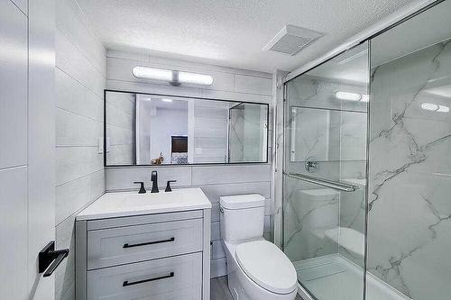 155 Scurfield Place Nw, Calgary, AB - Indoor Photo Showing Bathroom