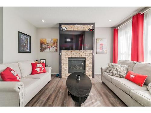52 Legacy Court Se, Calgary, AB - Indoor Photo Showing Living Room With Fireplace