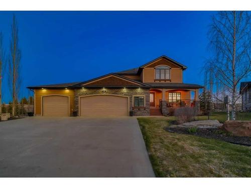 119 Montclair Place, Rural Rocky View County, AB - Outdoor With Deck Patio Veranda With Facade