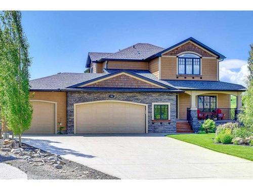 119 Montclair Place, Rural Rocky View County, AB - Outdoor With Deck Patio Veranda With Facade