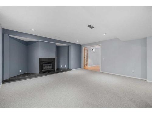 24 Westrose Avenue, Claresholm, AB - Indoor With Fireplace