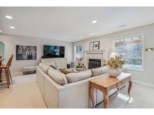 164 Scandia Hill Nw, Calgary, AB - Indoor Photo Showing Living Room With Fireplace