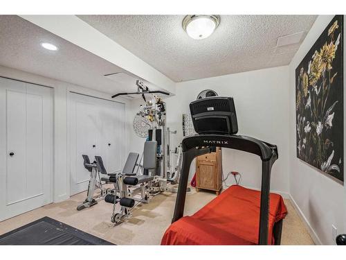 164 Scandia Hill Nw, Calgary, AB - Indoor Photo Showing Gym Room