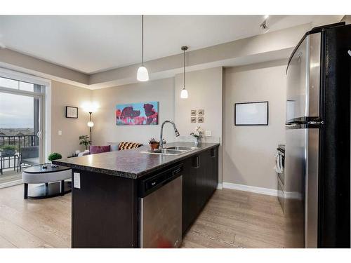 407-117 Copperpond Common Se, Calgary, AB - Indoor Photo Showing Kitchen With Double Sink