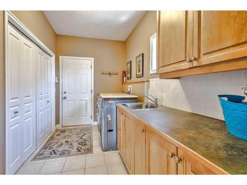 75 Palomino Boulevard, Rural Rocky View County, AB - Indoor Photo Showing Laundry Room