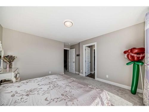 222 Carringsby Way Nw, Calgary, AB - Indoor Photo Showing Bedroom