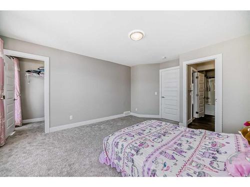 222 Carringsby Way Nw, Calgary, AB - Indoor Photo Showing Bedroom