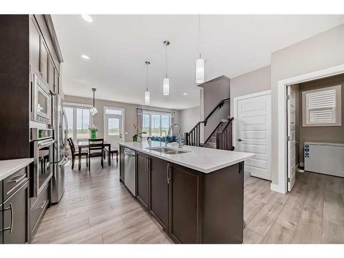 222 Carringsby Way Nw, Calgary, AB - Indoor Photo Showing Kitchen With Upgraded Kitchen