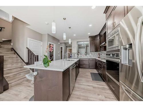 222 Carringsby Way Nw, Calgary, AB - Indoor Photo Showing Kitchen With Double Sink With Upgraded Kitchen