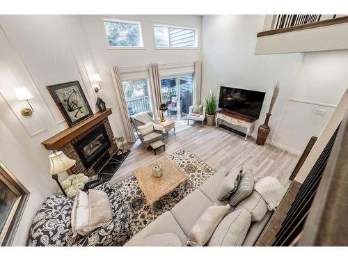 280 Point Mckay Terrace Nw, Calgary, AB - Indoor Photo Showing Other Room With Fireplace