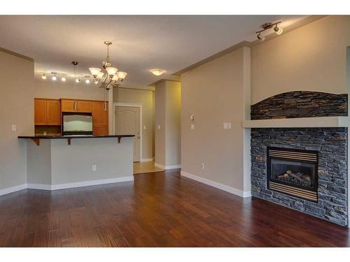 409-20 Discovery Ridge Close Sw, Calgary, AB - Indoor With Fireplace