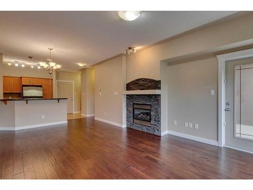 409-20 Discovery Ridge Close Sw, Calgary, AB - Indoor With Fireplace